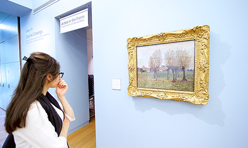 female student in art gallery